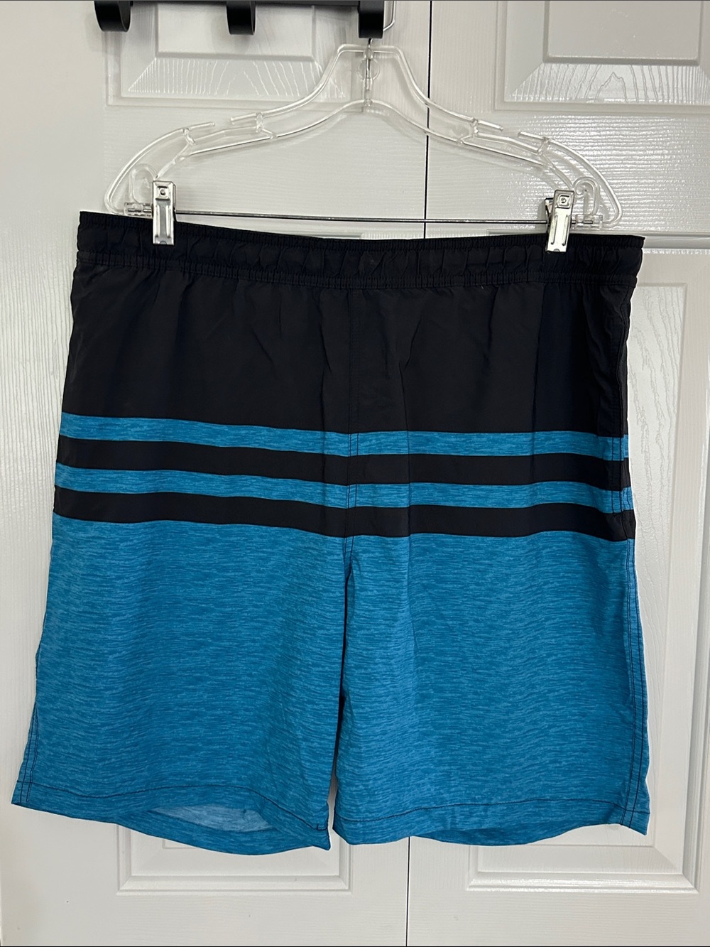 Kirkland Signature Black and Blue Men’s Swim Trunks with Stripe Detail